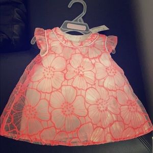 Baby dress. Size: 0-3 months. Coral color